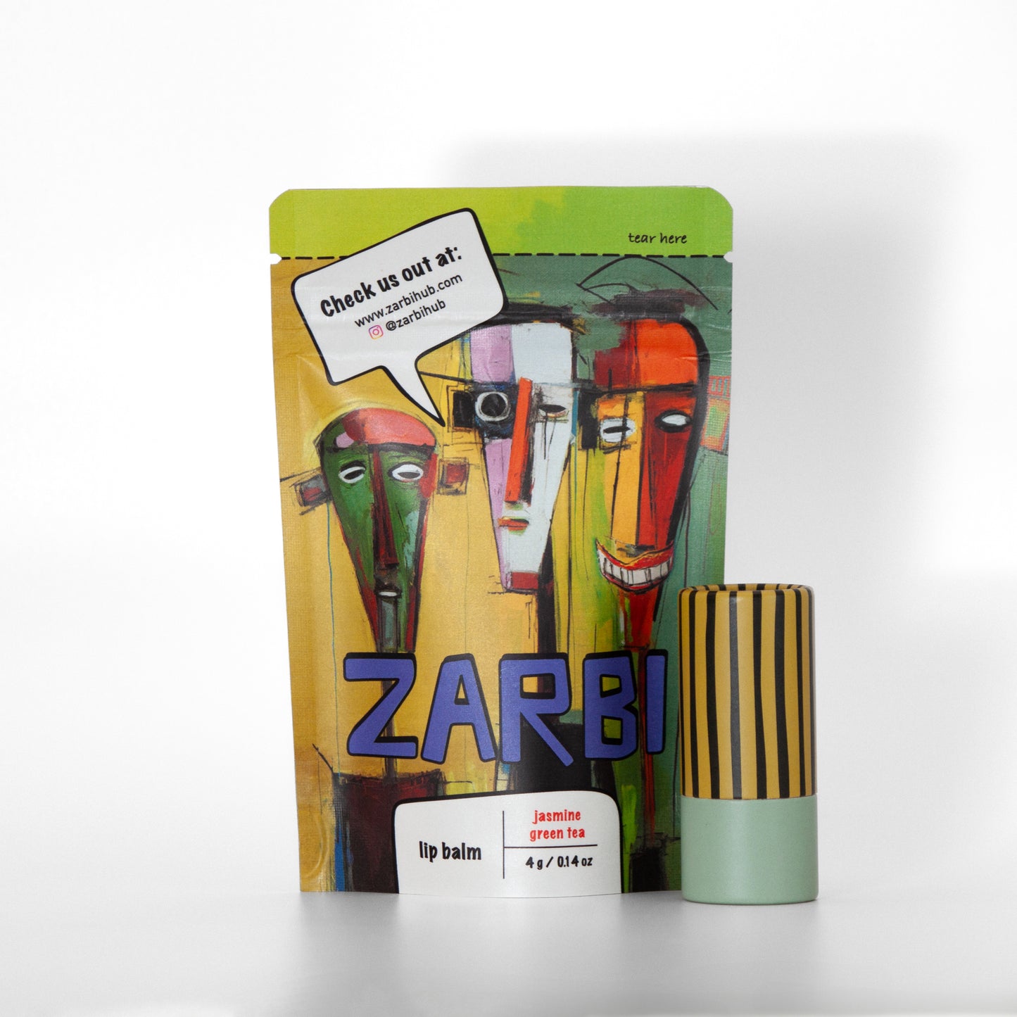 Twist-up Jasmine Green Tea lip balm tube with yellowish green cap, black stripes, mint base, 0.14 net oz. Stand-up green tear-off pouch with 3 multicolor cartoon figures, Zarbi logo, speech bubble with social media info.